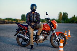 male-student-poses-on-motorbike-motorcycle-school-2022-02-18-04-34-30-utc.jpg